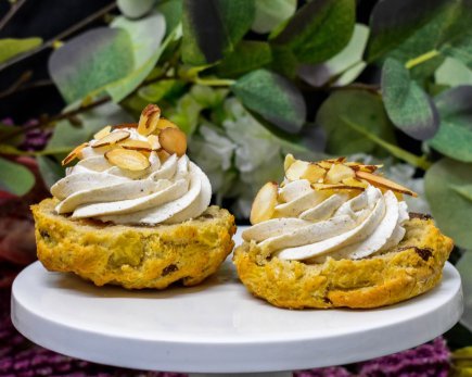 Apple and sultana scones topped with spiced cream and toasted almonds (v)